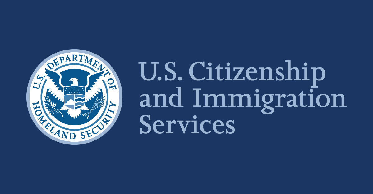 Blue USCIS graphic used to illustrate the agency's March 2026 hold-lifting announcement